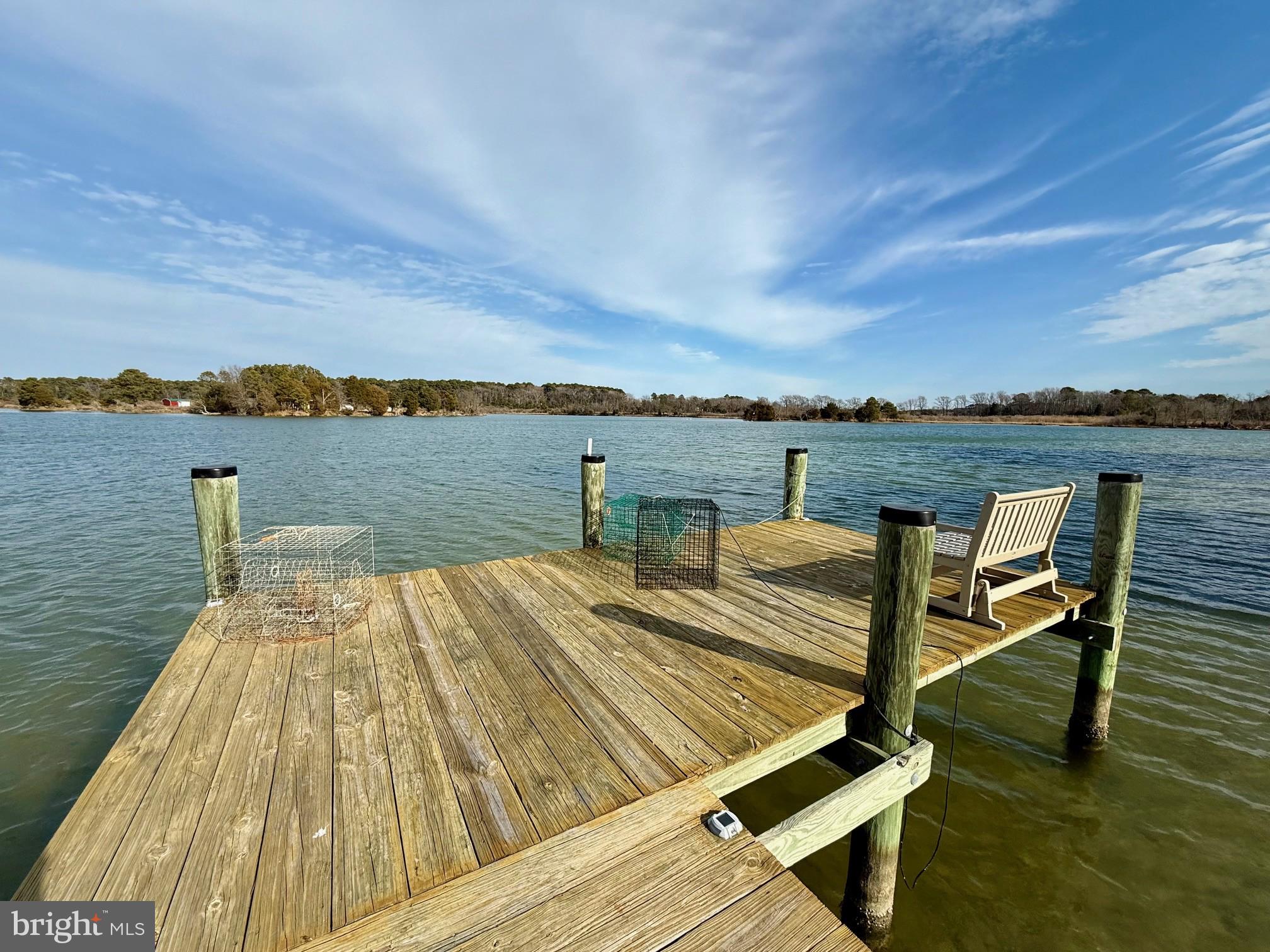 49005 Harry James Road Ridge, MD 20680 - Photo 63 of 71 a view of a terrace with outdoor seating