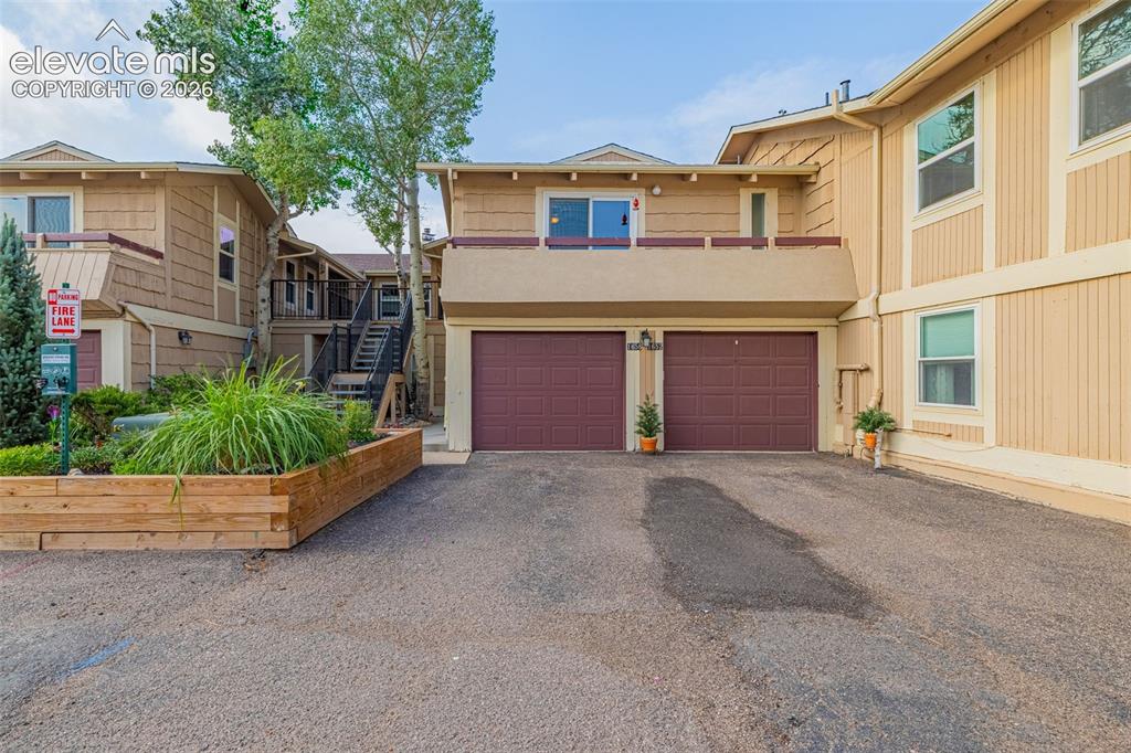1658 Deer Creek Road Monument, CO 80132 - Photo 2 of 21 Upper level condo with 1 car garage
