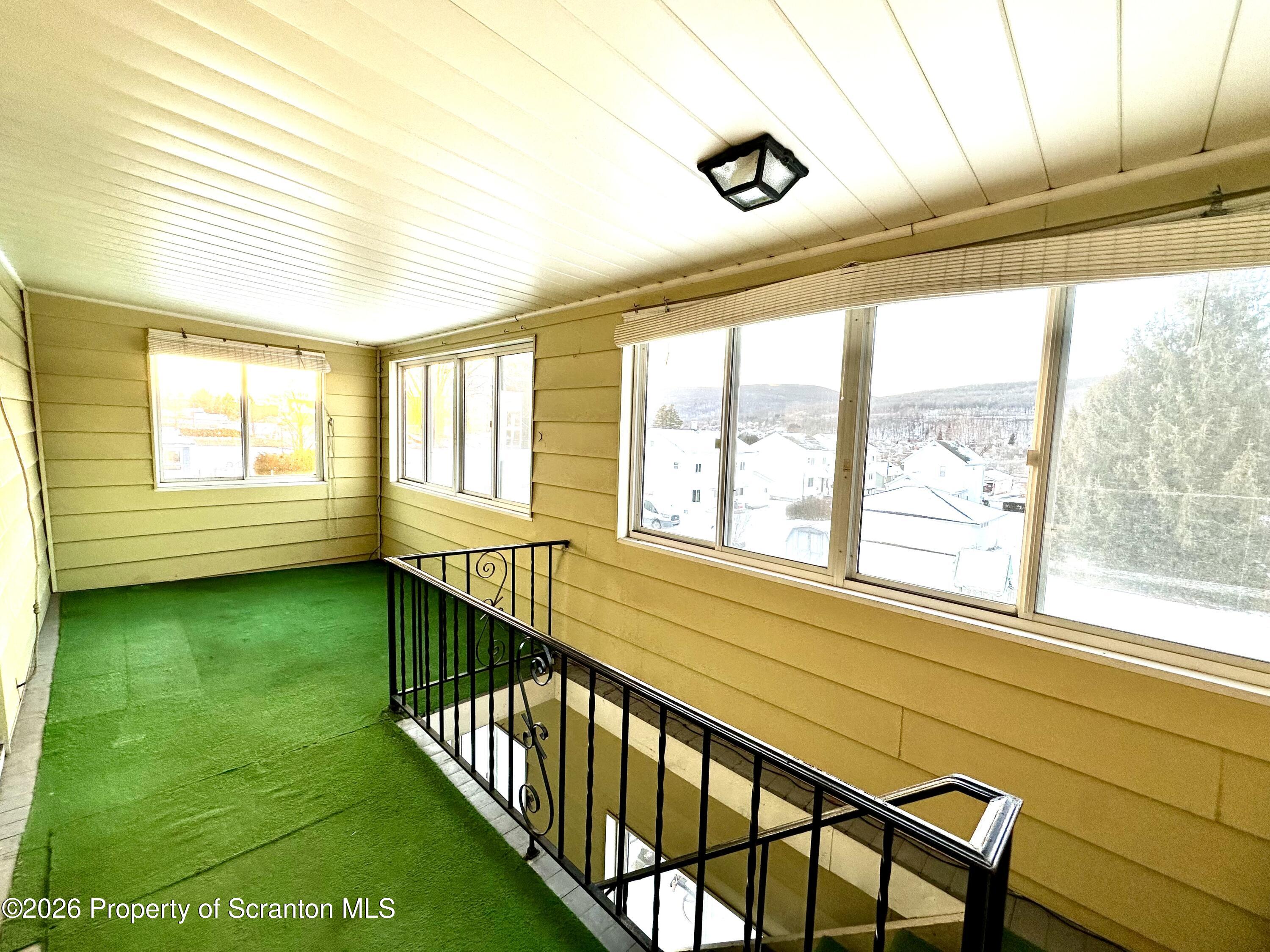 615 Delaware Street Mayfield, PA 18433 - Photo 27 of 29 Rear Upstairs Covered Porch