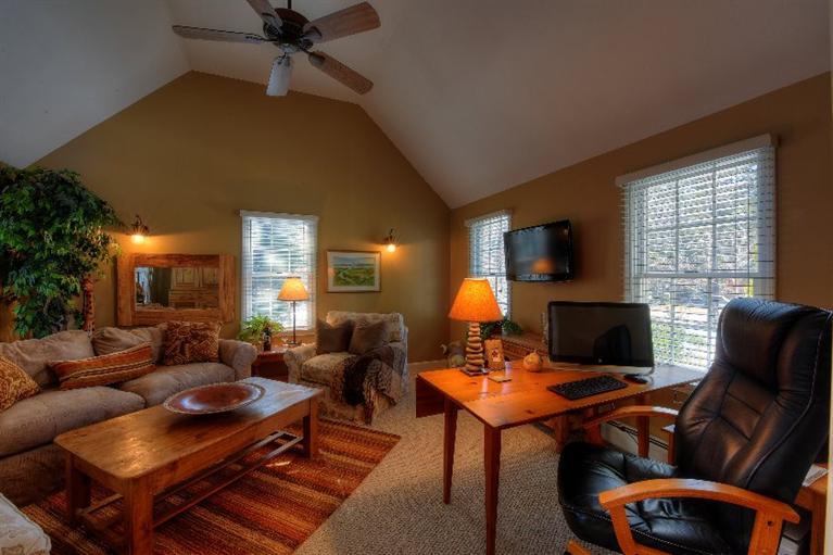 1325 Old Post Road Marstons Mills, MA 02648 - Photo 14 of 35 a living room with furniture a fireplace and a flat screen tv