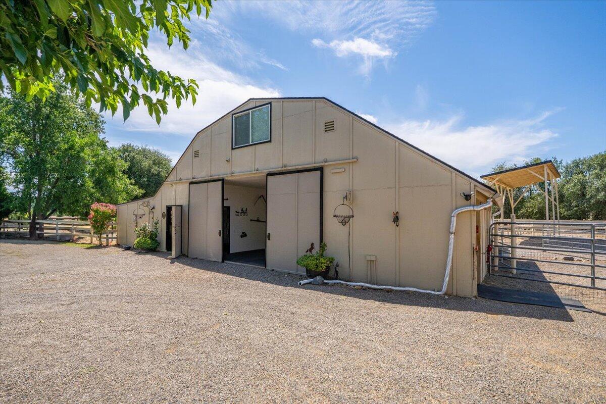 5521 Churn Crk Road Redding, CA 96002 - Photo 108 of 154 a view of a house with a street