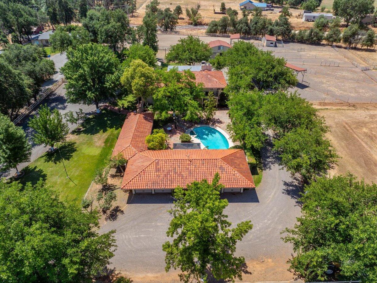 5521 Churn Crk Road Redding, CA 96002 - Photo 13 of 154 an aerial view of a house with a garden