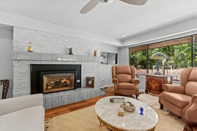 a view of a livingroom with workspace and a couch
