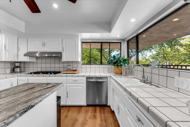 a bedroom with a bed and a cabinets