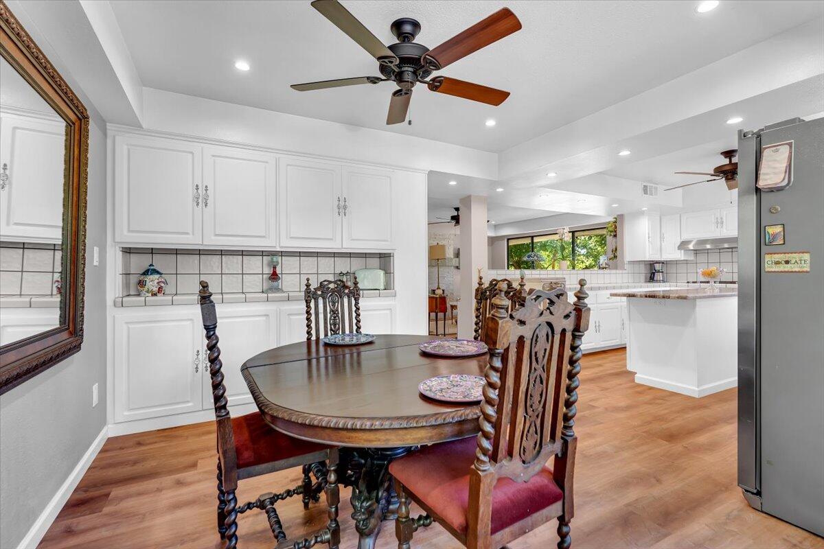5521 Churn Crk Road Redding, CA 96002 - Photo 39 of 154 a view of a dining room with furniture and a chandelier