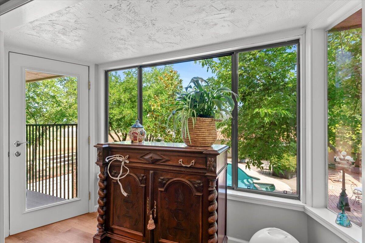 5521 Churn Crk Road Redding, CA 96002 - Photo 42 of 154 a view of a room that has a bed and a table in it