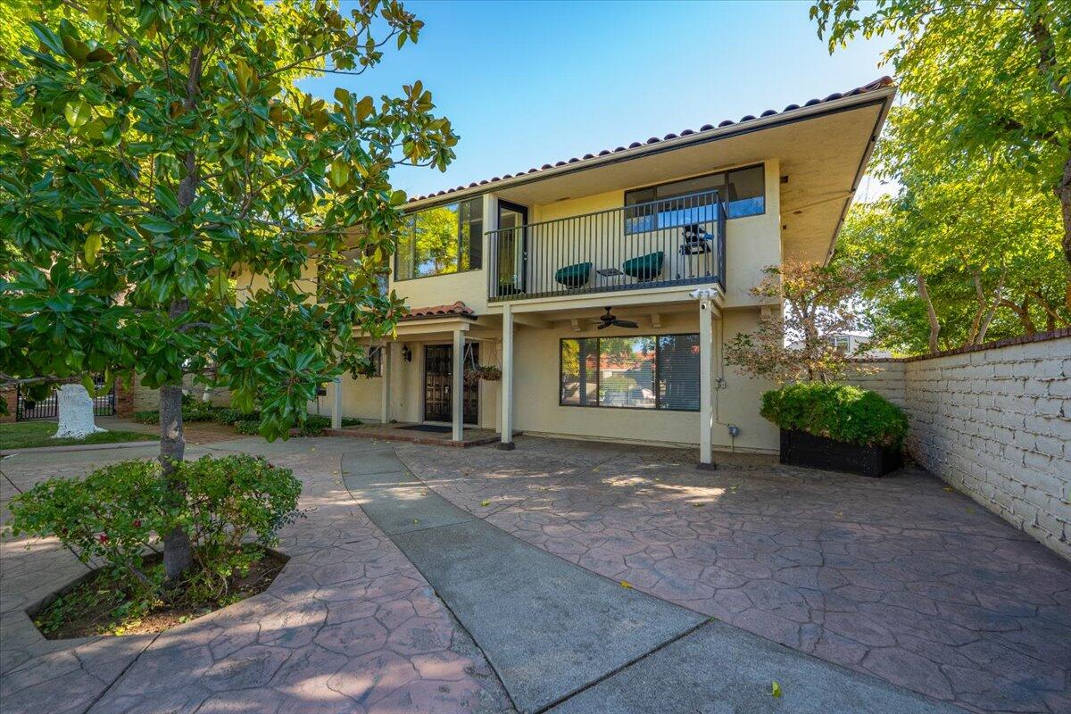 5521 Churn Crk Road Redding, CA 96002 - Photo 84 of 154 a front view of a house with a yard and a garage