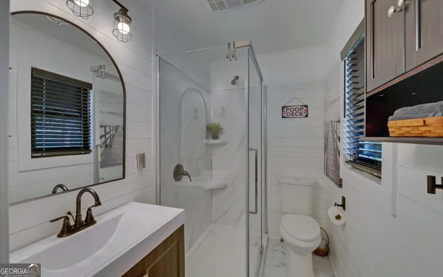 a view of empty room with stairs