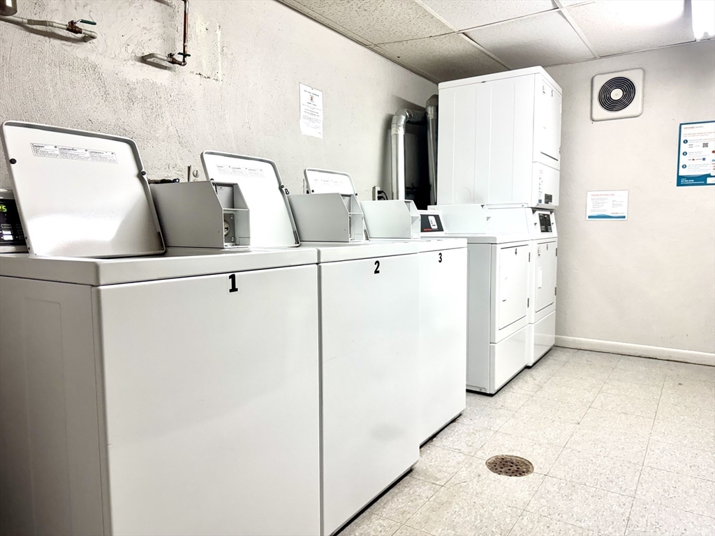 36 Main Street, Unit 26 North Reading, MA 01864 - Photo 14 of 19 a utility room with dryer and washer