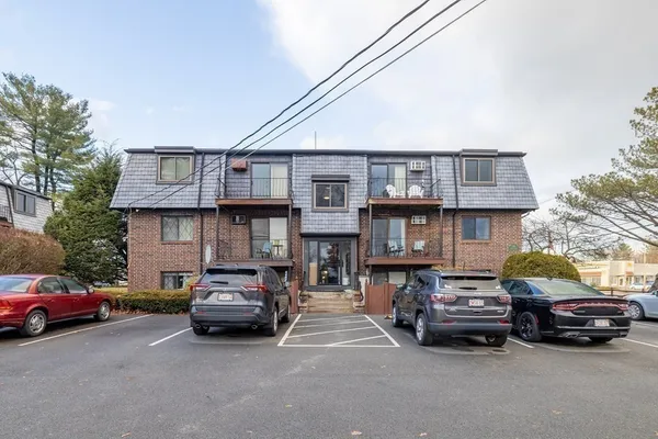 a car parked in front of a house