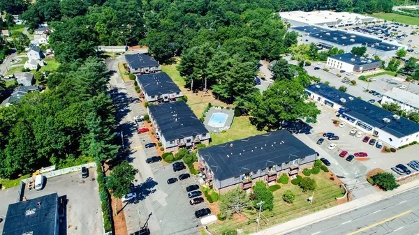 an aerial view of house with yard