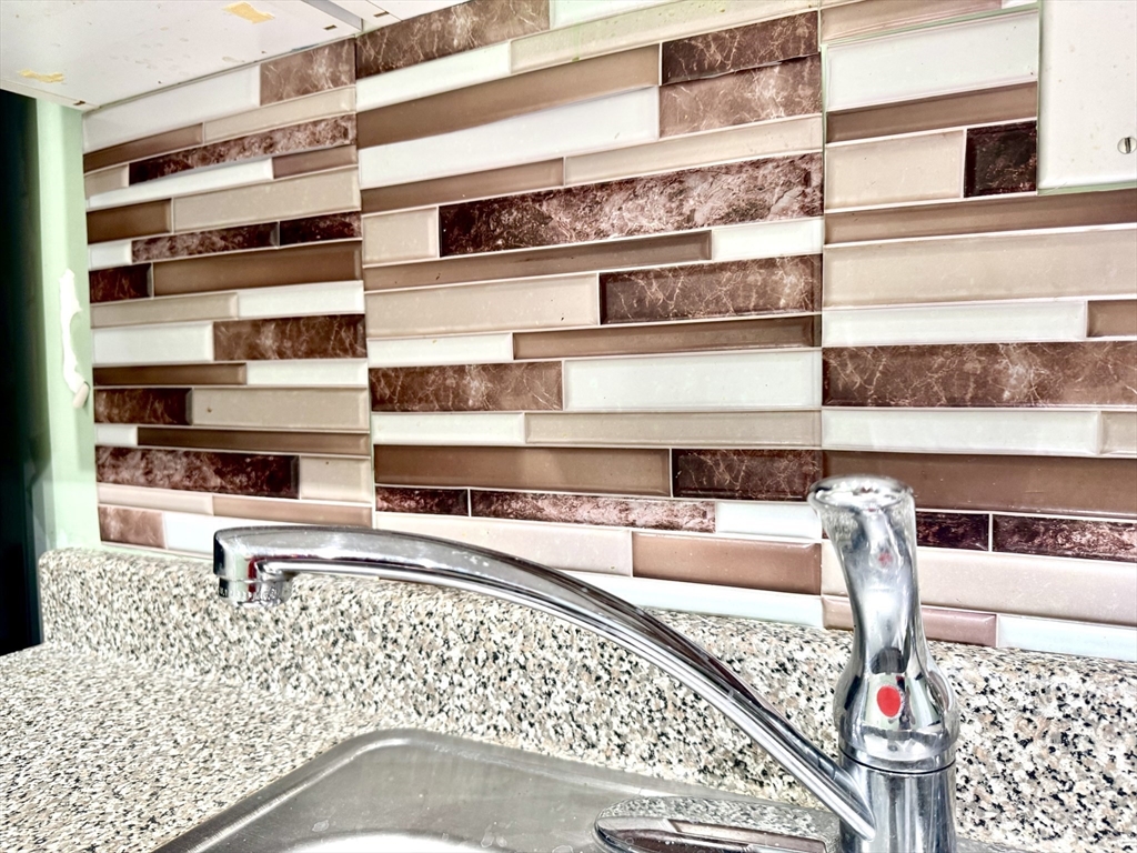 36 Main Street, Unit 26 North Reading, MA 01864 - Photo 3 of 19 a picture of a living room with a rug