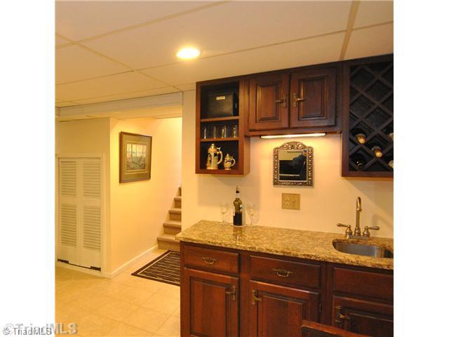 812 Chester Road Winston-Salem, NC 27104 - Photo 10 of 16 Other. View of steps to lower level bonus room with wet bar