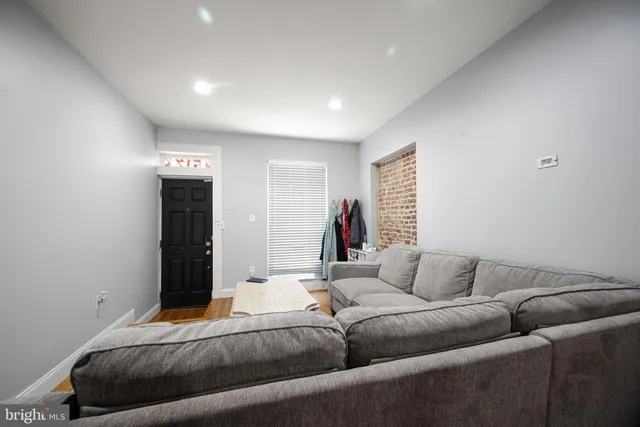 a living room with furniture and a couch