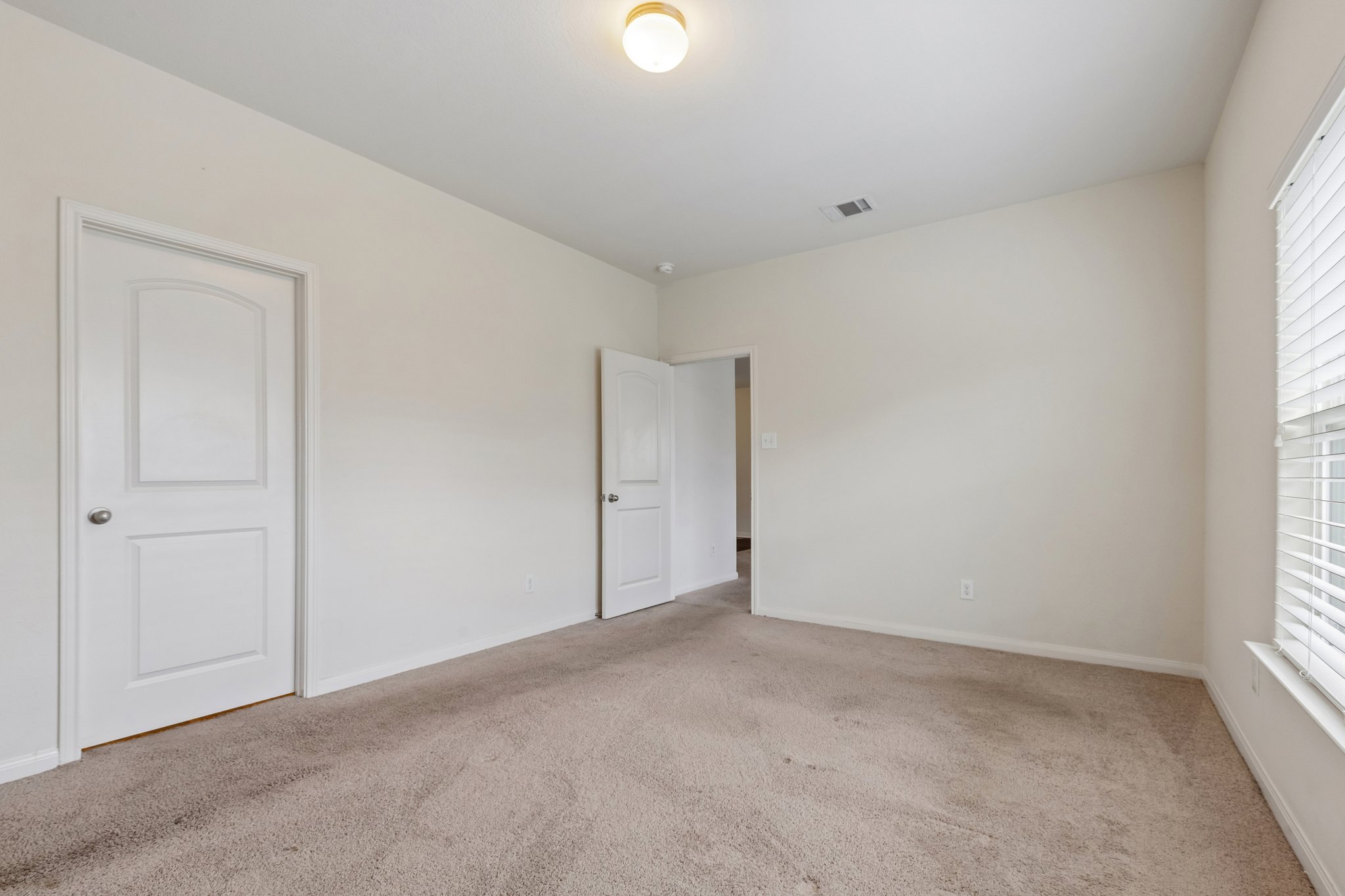 704 Cleary Lane Jarrell, TX 76537 - Photo 9 of 25 Neutral tone wall finishes throughout