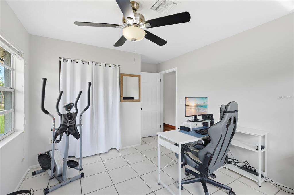 3670 Sunset Beach Drive Venice, FL 34293 - Photo 19 of 51 a view of a workspace with furniture and a window