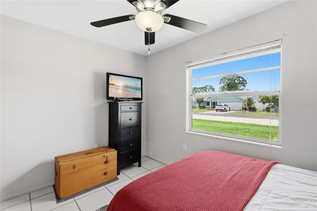 3670 Sunset Beach Drive Venice, FL 34293 - Photo 22 of 51 a bedroom with a bed and a window