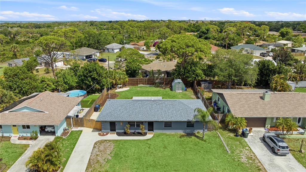 3670 Sunset Beach Drive Venice, FL 34293 - Photo 3 of 51 an aerial view of a house with swimming pool garden and patio