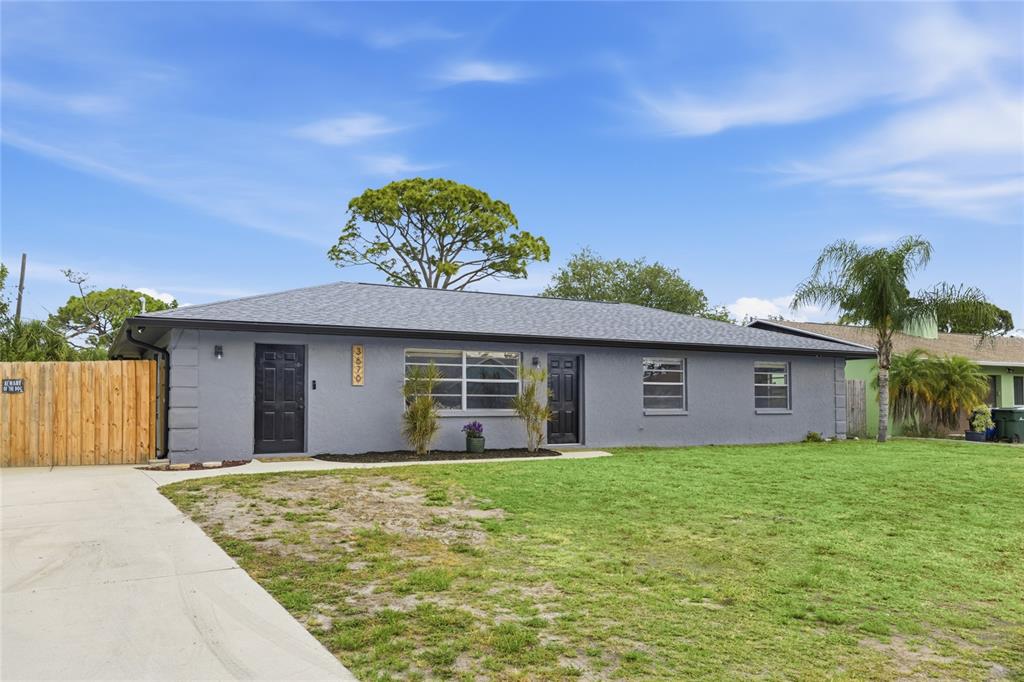 3670 Sunset Beach Drive Venice, FL 34293 - Photo 32 of 51 a view of a house with a yard