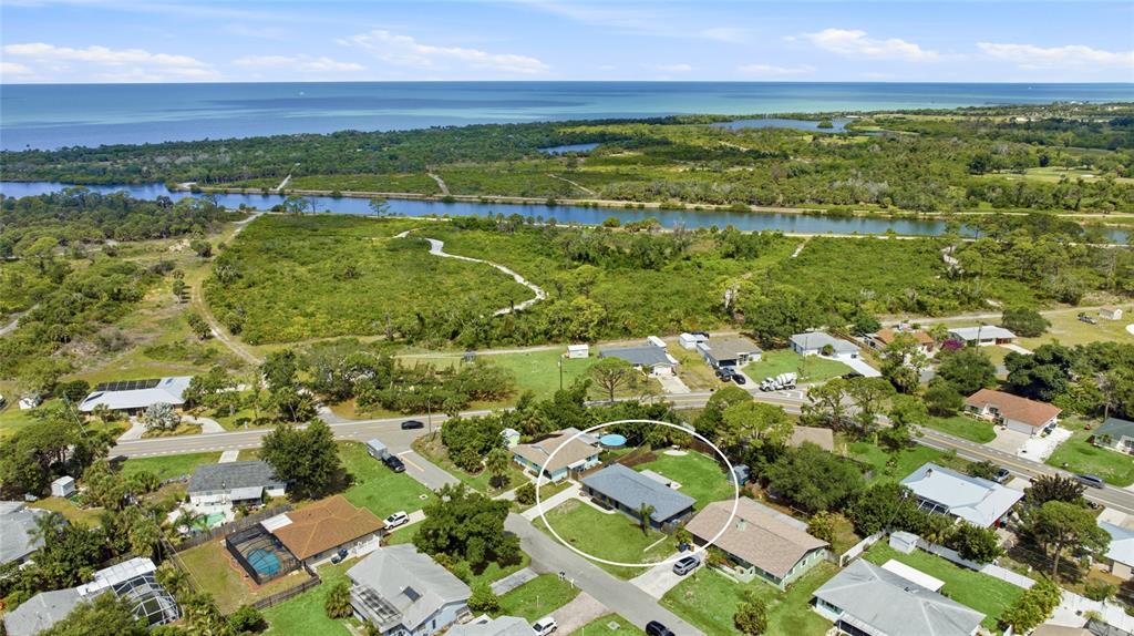 3670 Sunset Beach Drive Venice, FL 34293 - Photo 33 of 51 a view of a city with lots of residential buildings and ocean view in back