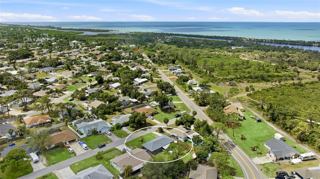 3670 Sunset Beach Drive Venice, FL 34293 - Photo 35 of 51 an aerial view of residential houses with outdoor space