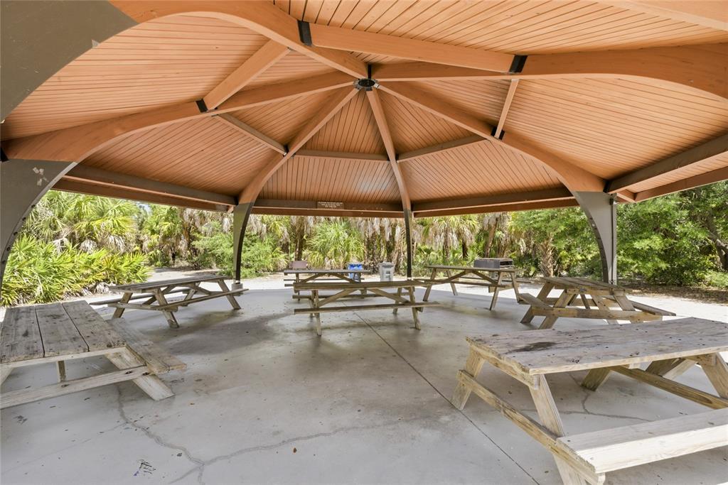 3670 Sunset Beach Drive Venice, FL 34293 - Photo 46 of 51 a view of a backyard with sitting area and furniture