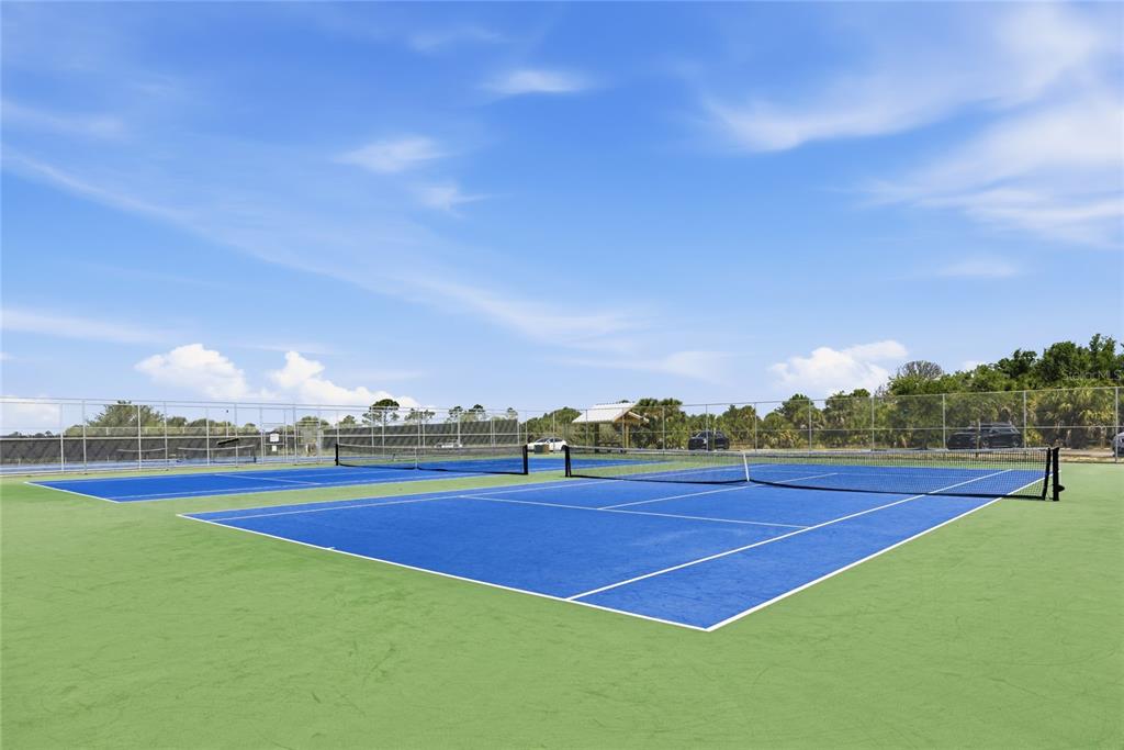3670 Sunset Beach Drive Venice, FL 34293 - Photo 49 of 51 a view of an outdoor space and tennis court