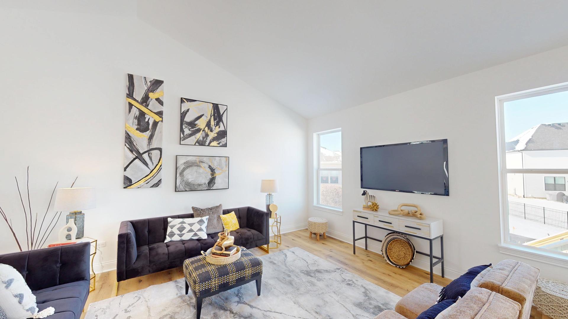 122 West Cache Isle Circle Channahon, IL 60410 - Photo 4 of 47 a living room with furniture and a flat screen tv