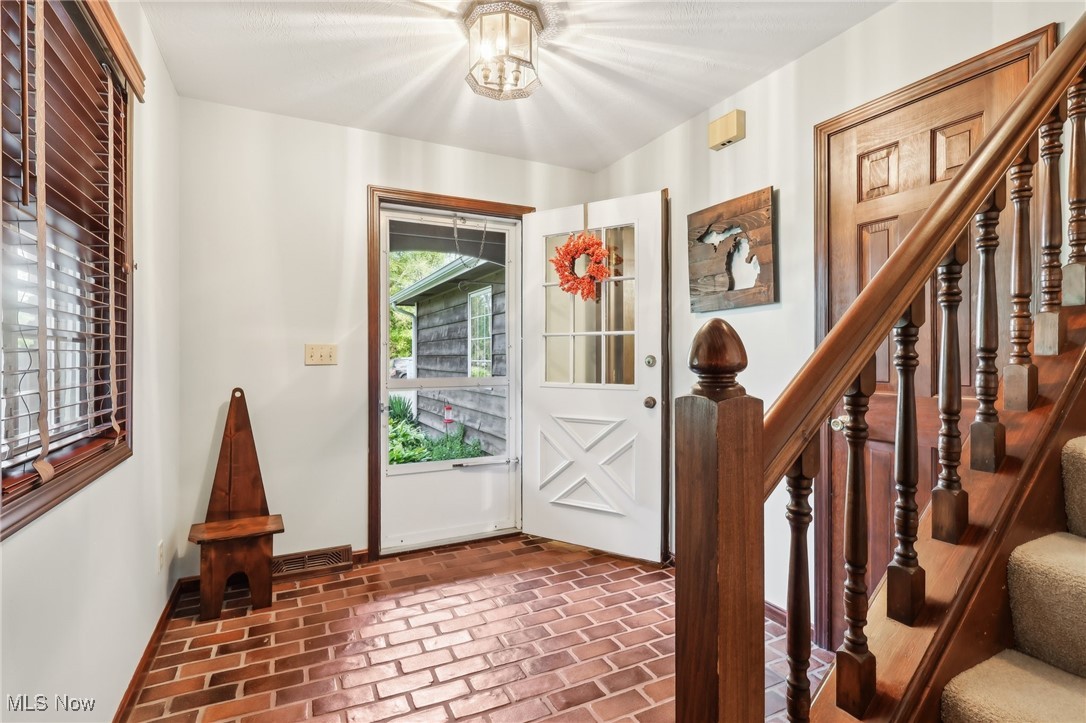 16737 Claridon Troy Road Burton, OH 44021 - Photo 6 of 46 The cobblestone floor and sturdy railings add character