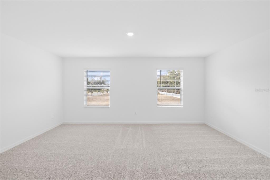 36148 Risa Michele Street Zephyrhills, FL 33541 - Photo 19 of 34 an empty room with a window