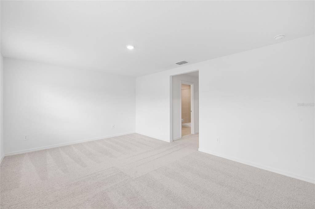 36148 Risa Michele Street Zephyrhills, FL 33541 - Photo 24 of 34 a view of an empty room