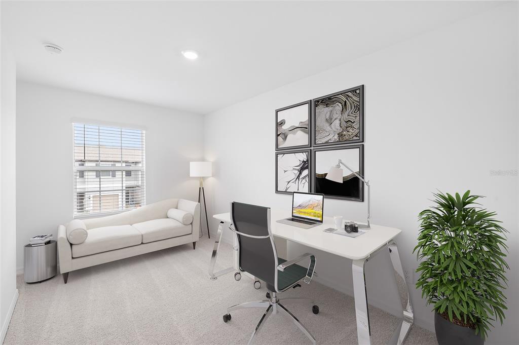 36148 Risa Michele Street Zephyrhills, FL 33541 - Photo 25 of 34 a living room with furniture and a window