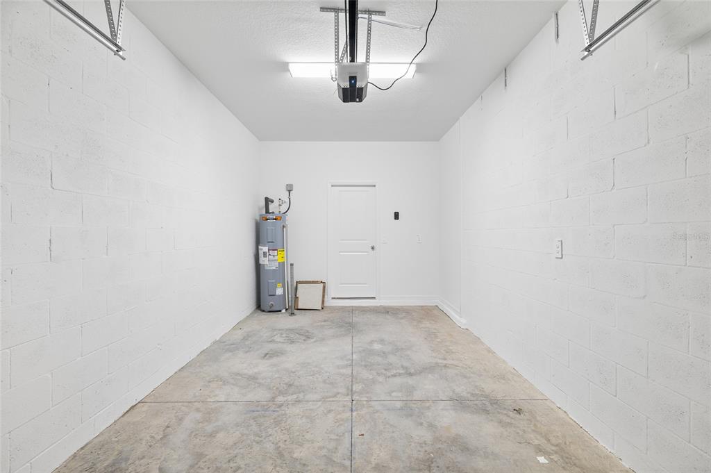 36148 Risa Michele Street Zephyrhills, FL 33541 - Photo 32 of 34 a view of empty room with ceiling fan