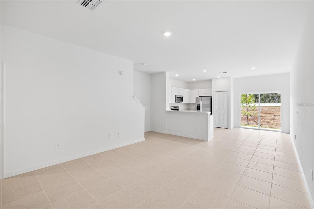 36148 Risa Michele Street Zephyrhills, FL 33541 - Photo 5 of 34 a view of a kitchen with a sink and a window