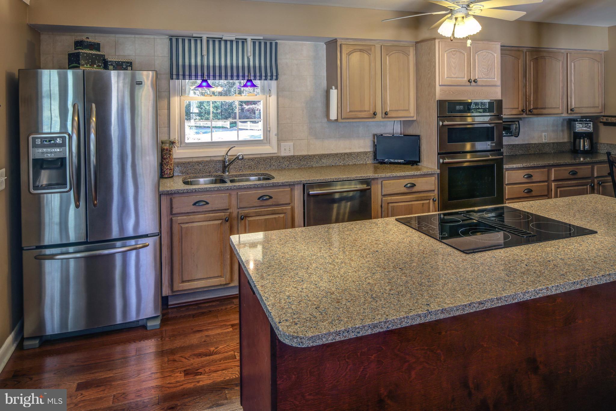 3284 Stepney Street Edgewater, MD 21037 - Photo 11 of 30 Stainless Appliances, New Counters, Wood Floors