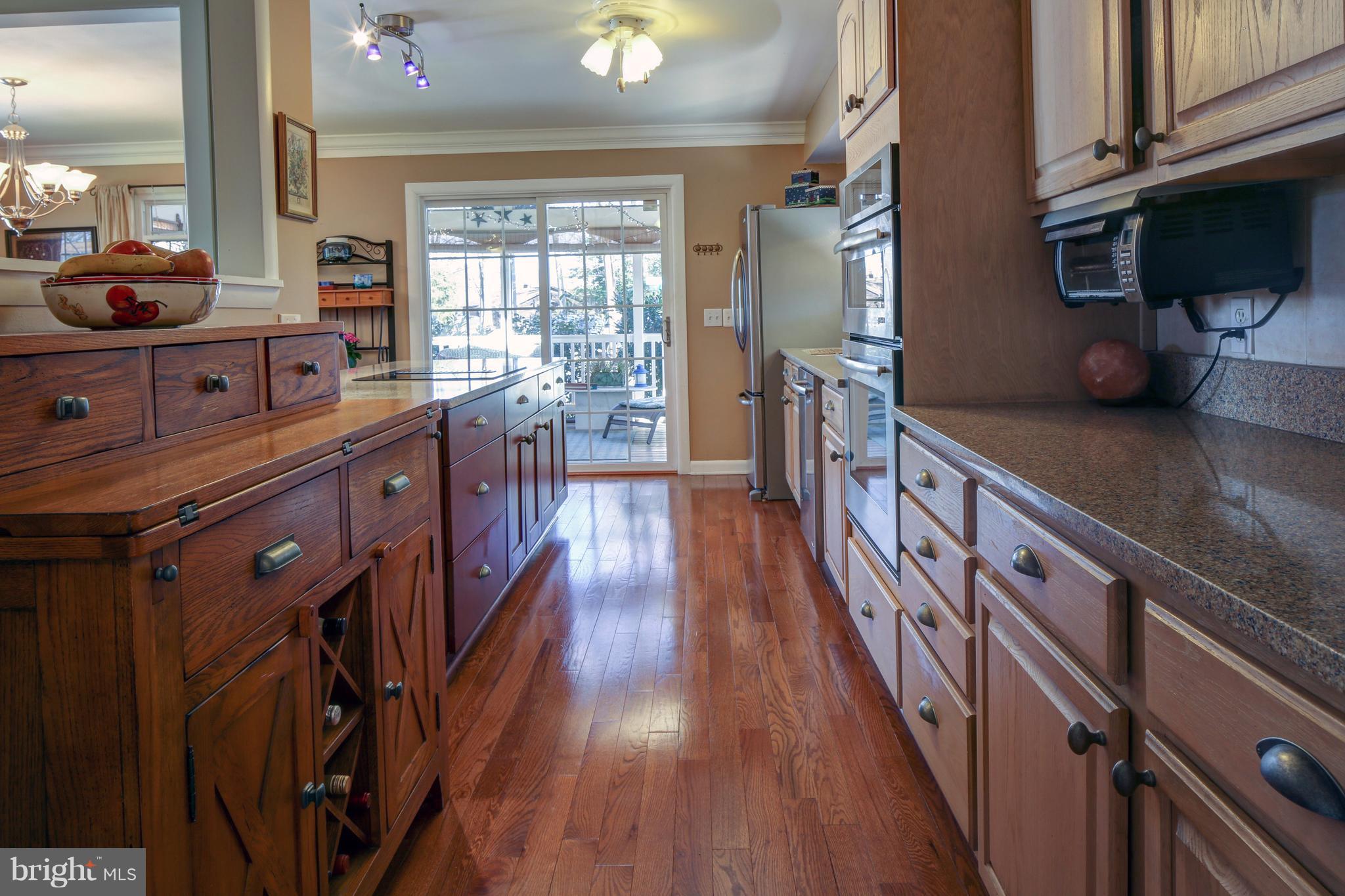 3284 Stepney Street Edgewater, MD 21037 - Photo 10 of 30 Kitchen leading to screened porch/deck