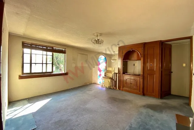 a bathroom with a granite countertop sink a mirror and a vanity