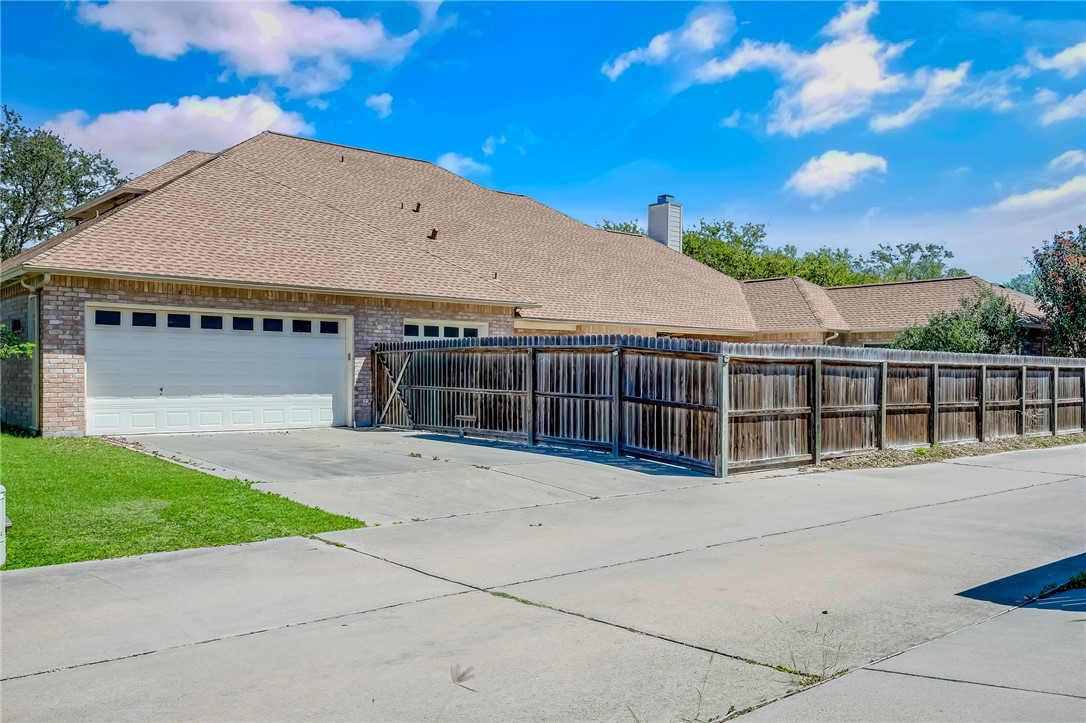 5917 Harvest Hill Road Corpus Christi, TX 78414 - Photo 37 of 40 a view of wooden house with a yard
