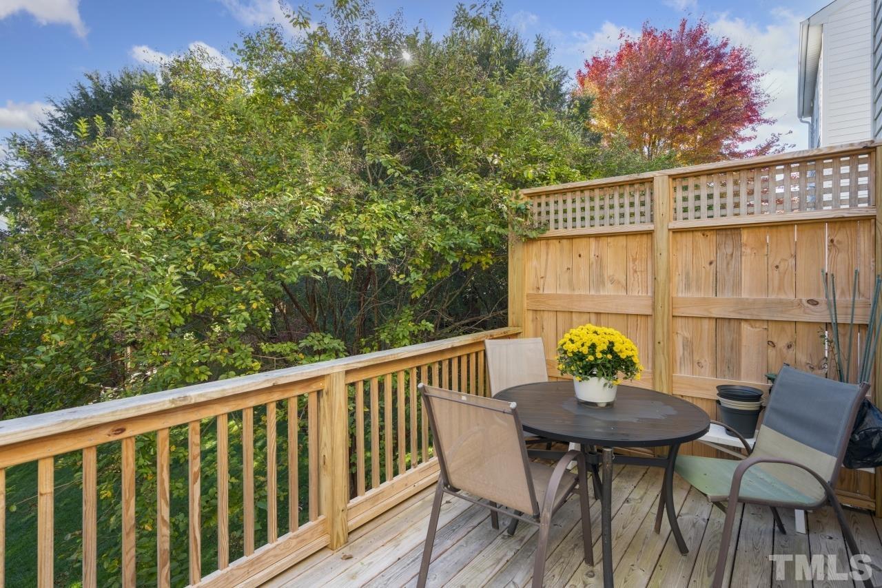 7106 Proctor Hill Drive Raleigh, NC 27613 - Photo 18 of 29 a view of balcony with furniture and outdoor seating