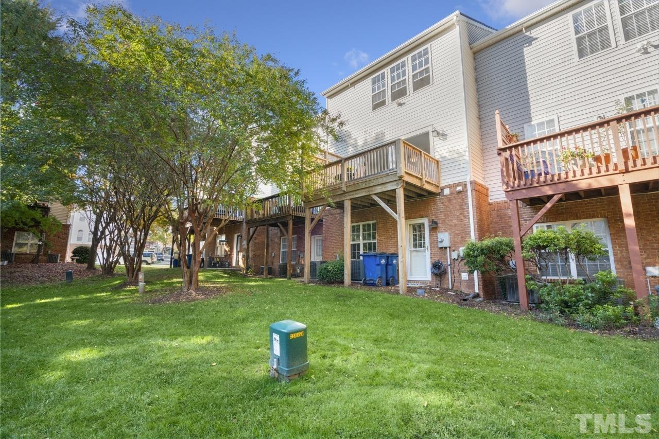 7106 Proctor Hill Drive Raleigh, NC 27613 - Photo 27 of 29 a view of a house with a yard and tree s