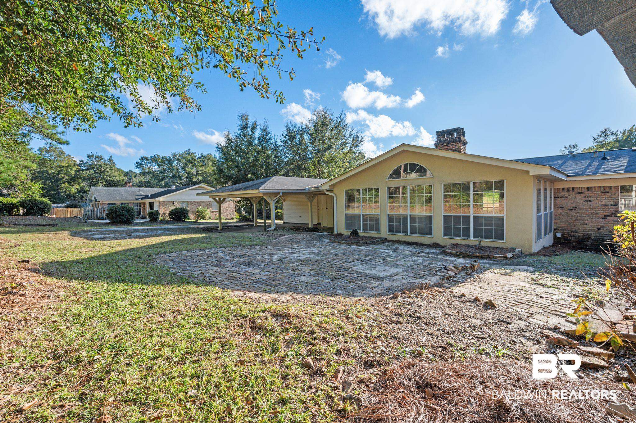 909 Caroline Avenue Daphne, AL 36526 - Photo 38 of 46 Ranch-style house with a front yard