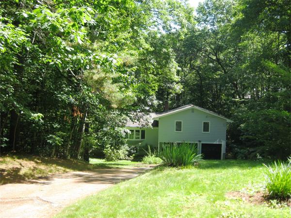 103 Temple Road Concord, MA 01742 - Photo 1 of 6 a house with a tree in front of it