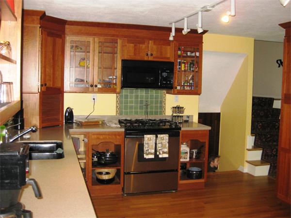 103 Temple Road Concord, MA 01742 - Photo 3 of 6 a living room with fireplace furniture and a flat screen tv