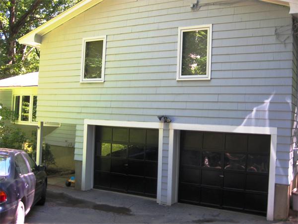 103 Temple Road Concord, MA 01742 - Photo 6 of 6 a view of a house with a door and balcony