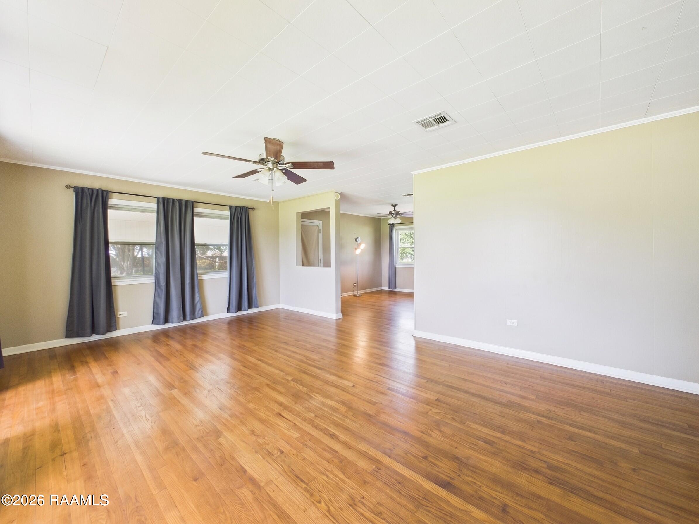 2700 Captain Cade Road Broussard, LA 70518 - Photo 9 of 20 2700 Captain Cade_06 - INT - Living RM (