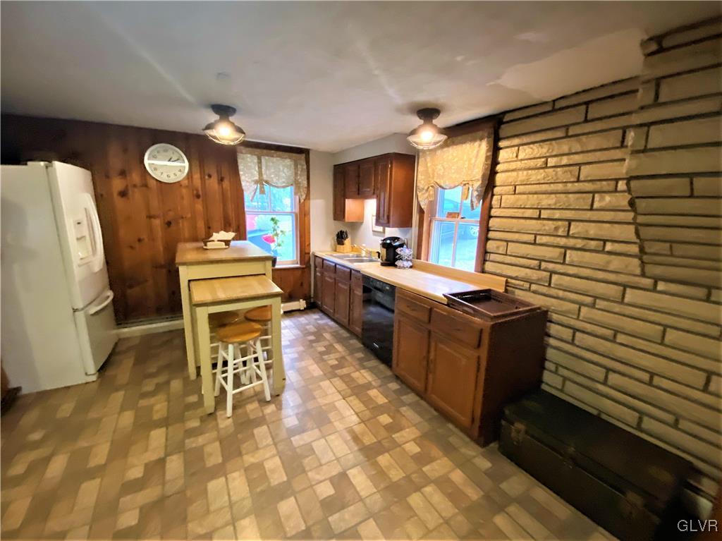 2102 Nemeth Drive Bethlehem, PA 18015 - Photo 18 of 33 a room with stainless steel appliances lots of wooden furniture