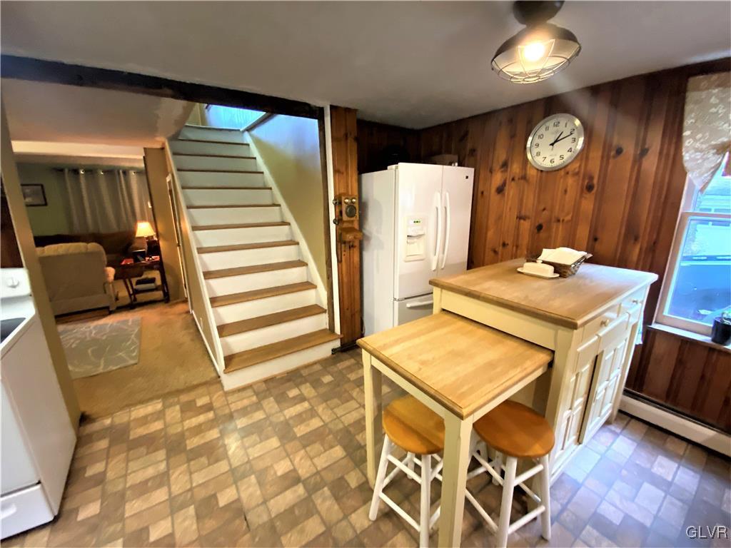 2102 Nemeth Drive Bethlehem, PA 18015 - Photo 19 of 33 a dining room with furniture and a clock