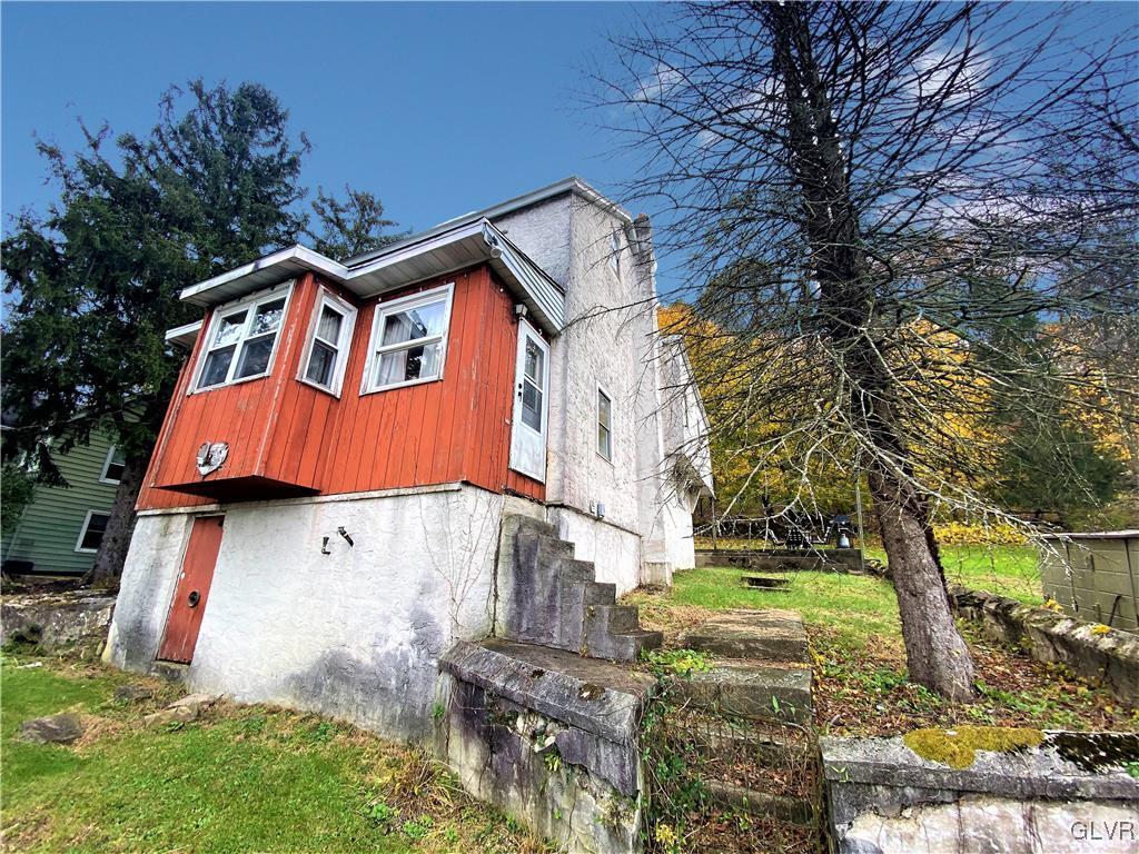 2102 Nemeth Drive Bethlehem, PA 18015 - Photo 2 of 33 a front view of house with yard and trees around