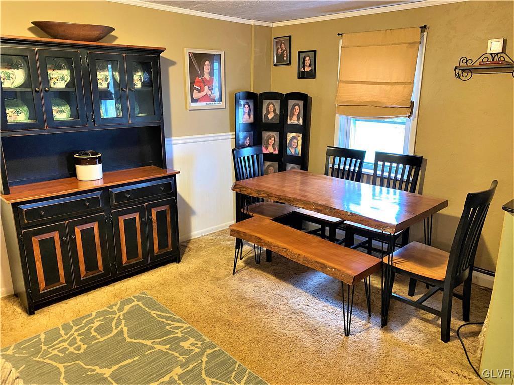 2102 Nemeth Drive Bethlehem, PA 18015 - Photo 26 of 33 a living room with furniture a rug and a window