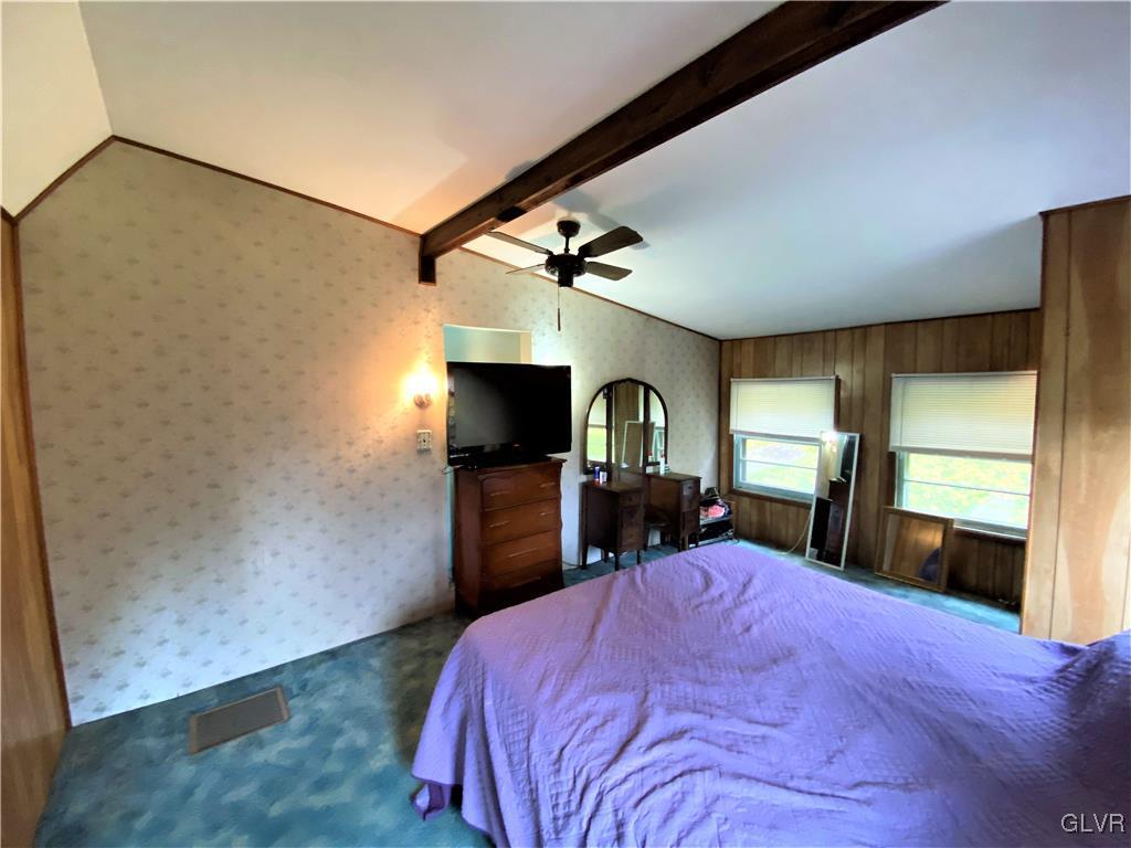 2102 Nemeth Drive Bethlehem, PA 18015 - Photo 28 of 33 a bedroom with a bed and a flat screen tv